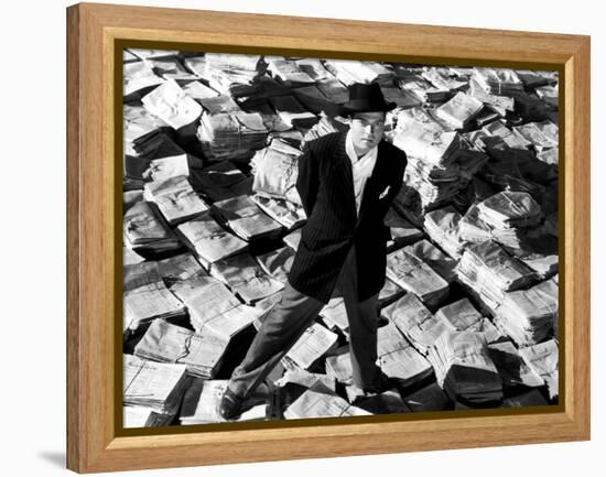 Citizen Kane, Orson Welles, 1941, Astride Stacks Of Newspaper-null-Framed Stretched Canvas