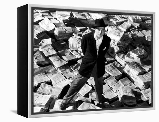 Citizen Kane, Orson Welles, 1941, Astride Stacks Of Newspaper-null-Framed Stretched Canvas