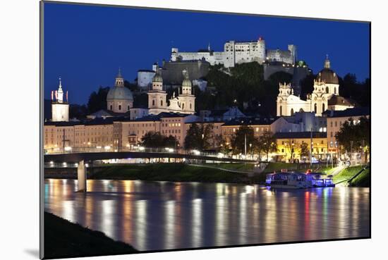 City at Night of Salzach River with Churches of Salzburg and Hohensalzburg Fortress, Austria-Julian Castle-Mounted Photo
