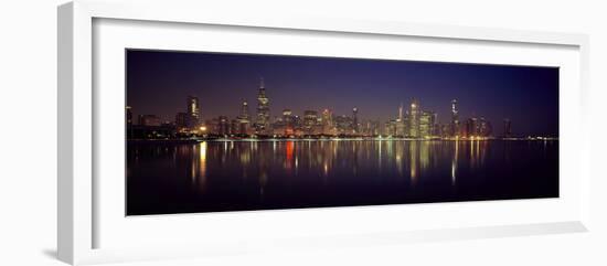 City skyline reflecting in Lake Michigan at night, Chicago, Illinois, USA-Panoramic Images-Framed Photographic Print