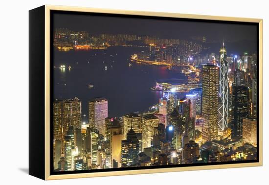 City skyline viewed from Victoria Peak by night, Hong Kong, China, Asia-Fraser Hall-Framed Premier Image Canvas