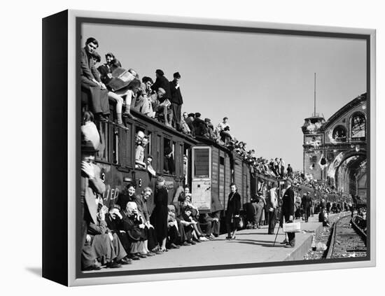 Civilans Packing onto Overcrowded Train in Postwar Berlin-Margaret Bourke-White-Framed Premier Image Canvas