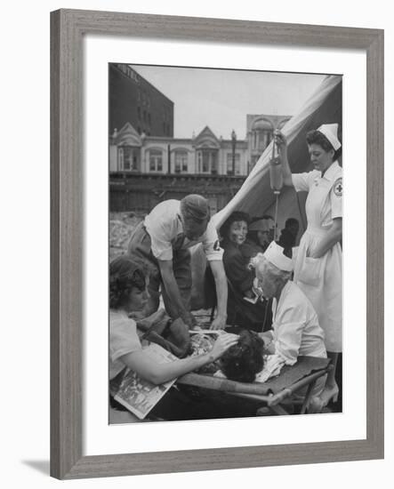 Civilian Receiving a Blood Transfusion from the British Red Cross Setup in a Tent-Allan Grant-Framed Photographic Print