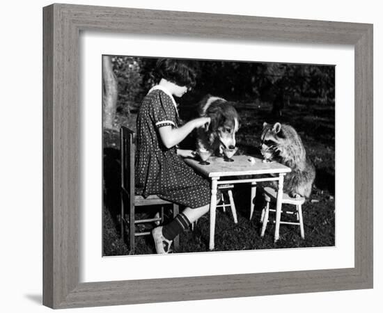 Claire Shorrock Giving Ice Cream Party with Pet Dog and Raccoon-null-Framed Photographic Print