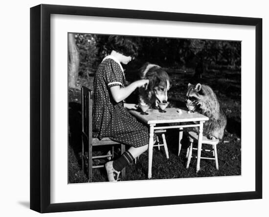 Claire Shorrock Giving Ice Cream Party with Pet Dog and Raccoon-null-Framed Photographic Print