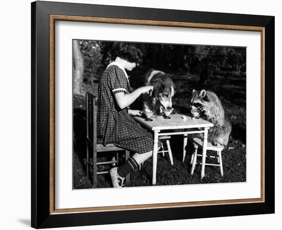 Claire Shorrock Giving Ice Cream Party with Pet Dog and Raccoon-null-Framed Photographic Print