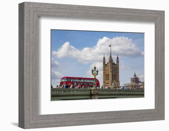 Classic double decker tour bus in London, England crossing the bridge River Thames-Michele Niles-Framed Photographic Print