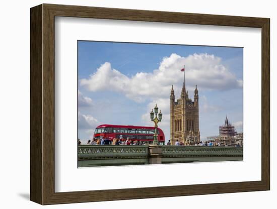 Classic double decker tour bus in London, England crossing the bridge River Thames-Michele Niles-Framed Photographic Print