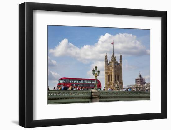 Classic double decker tour bus in London, England crossing the bridge River Thames-Michele Niles-Framed Photographic Print