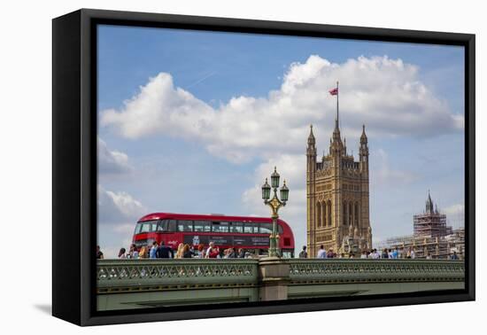 Classic double decker tour bus in London, England crossing the bridge River Thames-Michele Niles-Framed Premier Image Canvas