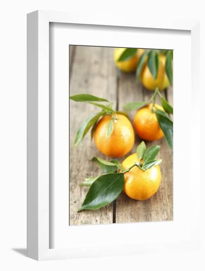 Clementines with Leaves on Wood-Nikky-Framed Photographic Print