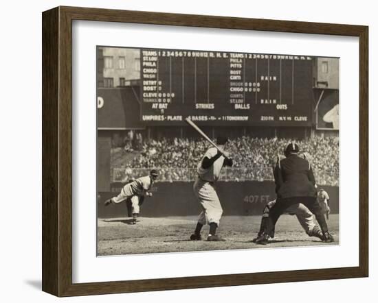 Cleveland Indians', Bob Feller, Pitching to New York Yankees' Joe Dimaggio-null-Framed Photo