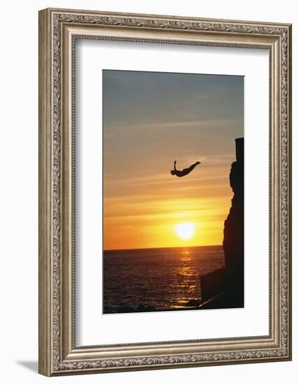 Cliff Diver above Setting Sun-Bob Krist-Framed Photographic Print