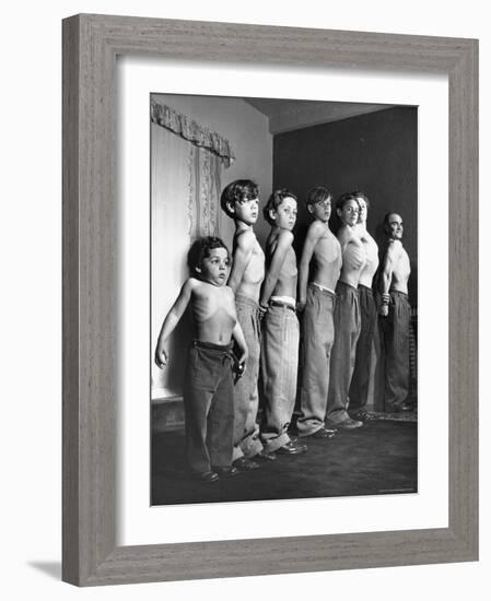 Clifford Brill Severn in Shirtless Lineup with His Sons Demonstrating Techniques of Muscle Control-Peter Stackpole-Framed Photographic Print