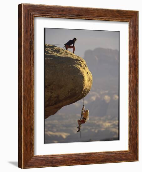 Climber Dangling-null-Framed Photographic Print