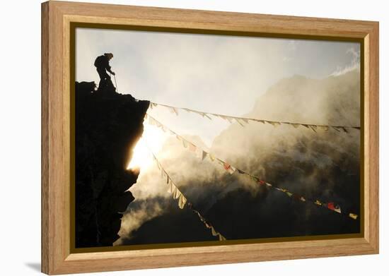 Climber on Kala Pattar Peak (5545M) with Buddhist Prayer Flags at Sunset, Nepal, Himalaya-Enrique Lopez-Tapia-Framed Premier Image Canvas