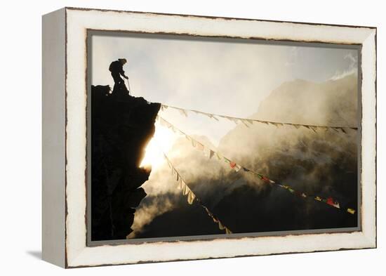 Climber on Kala Pattar Peak (5545M) with Buddhist Prayer Flags at Sunset, Nepal, Himalaya-Enrique Lopez-Tapia-Framed Premier Image Canvas