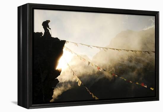 Climber on Kala Pattar Peak (5545M) with Buddhist Prayer Flags at Sunset, Nepal, Himalaya-Enrique Lopez-Tapia-Framed Premier Image Canvas