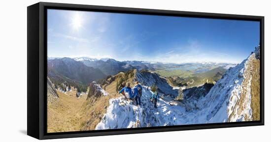 Climbers on steep crest covered with snow in the Ammergau Alps, Tegelberg, Fussen, Bavaria, Germany-Roberto Moiola-Framed Premier Image Canvas