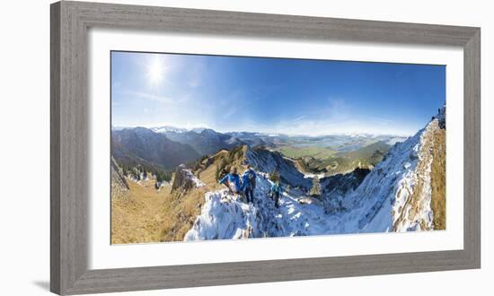 Climbers on steep crest covered with snow in the Ammergau Alps, Tegelberg, Fussen, Bavaria, Germany-Roberto Moiola-Framed Photographic Print