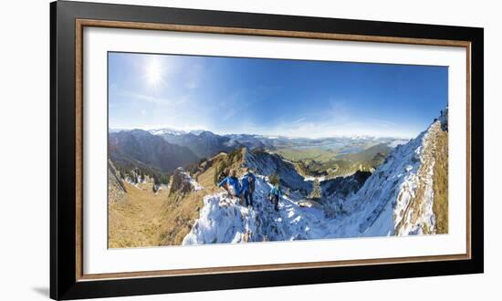 Climbers on steep crest covered with snow in the Ammergau Alps, Tegelberg, Fussen, Bavaria, Germany-Roberto Moiola-Framed Photographic Print