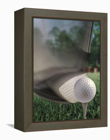 Close-up of a Golf Club Hitting a Golf Ball on a Tee-null-Framed Premier Image Canvas