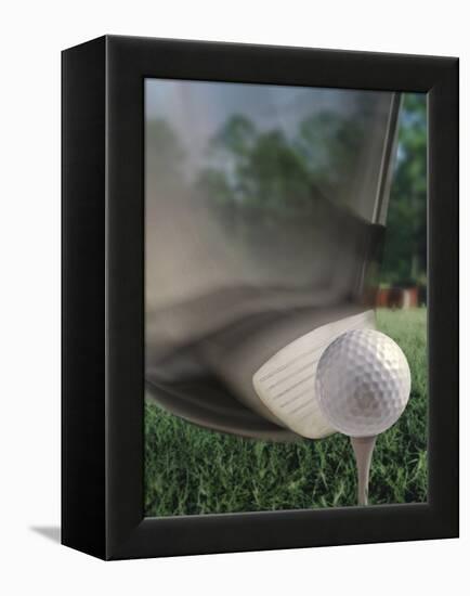 Close-up of a Golf Club Hitting a Golf Ball on a Tee-null-Framed Premier Image Canvas