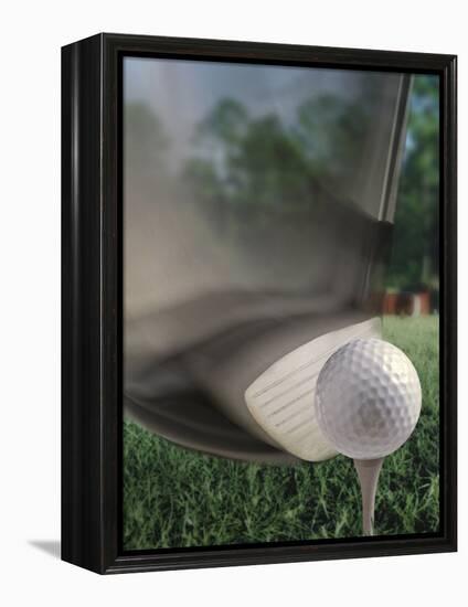 Close-up of a Golf Club Hitting a Golf Ball on a Tee-null-Framed Premier Image Canvas