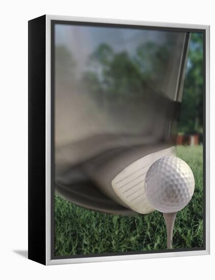 Close-up of a Golf Club Hitting a Golf Ball on a Tee-null-Framed Premier Image Canvas