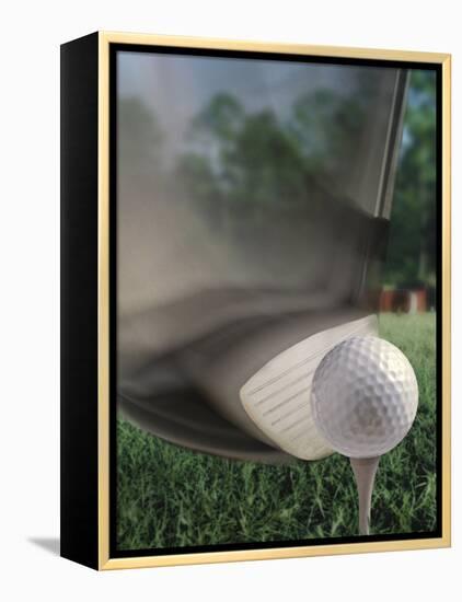 Close-up of a Golf Club Hitting a Golf Ball on a Tee-null-Framed Premier Image Canvas