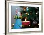 Close-Up of a Snow Man Candle in Front of a Tree with Christmas Lights-Winfred Evers-Framed Photographic Print