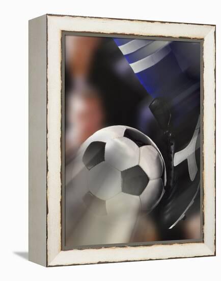 Close-up of a Soccer Player Kicking a Soccer Ball-null-Framed Premier Image Canvas