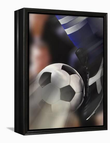 Close-up of a Soccer Player Kicking a Soccer Ball-null-Framed Premier Image Canvas