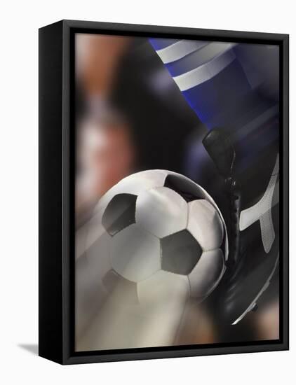 Close-up of a Soccer Player Kicking a Soccer Ball-null-Framed Premier Image Canvas