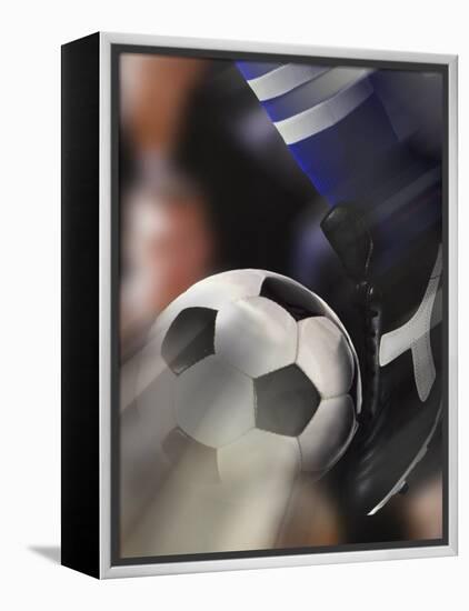 Close-up of a Soccer Player Kicking a Soccer Ball-null-Framed Premier Image Canvas