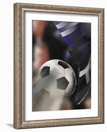 Close-up of a Soccer Player Kicking a Soccer Ball-null-Framed Photographic Print