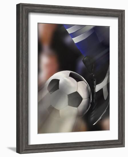 Close-up of a Soccer Player Kicking a Soccer Ball-null-Framed Photographic Print