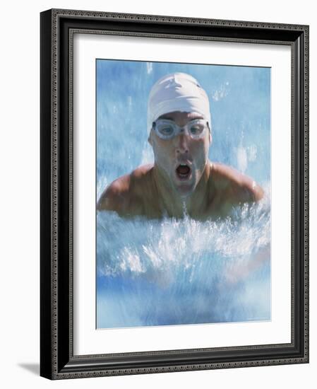 Close-up of a Young Man Swimming the Breaststroke-null-Framed Photographic Print