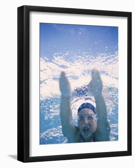 Close-up of a Young Man Swimming Underwater-null-Framed Photographic Print