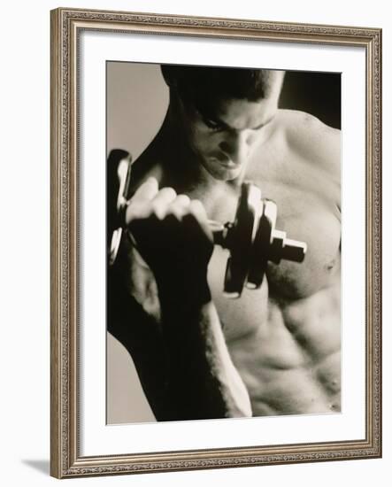 Close-up of a Young Man Working Out with a Dumbbell-null-Framed Photographic Print