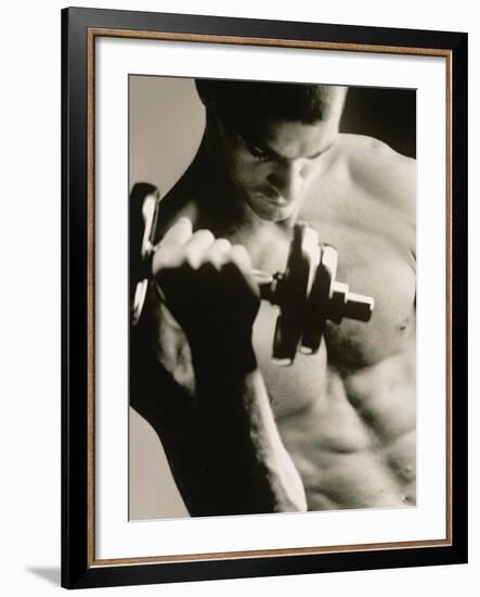 Close-up of a Young Man Working Out with a Dumbbell-null-Framed Photographic Print