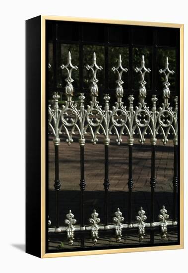 Close Up of Elaborate White Finials on Black Metal Railings-Natalie Tepper-Framed Stretched Canvas