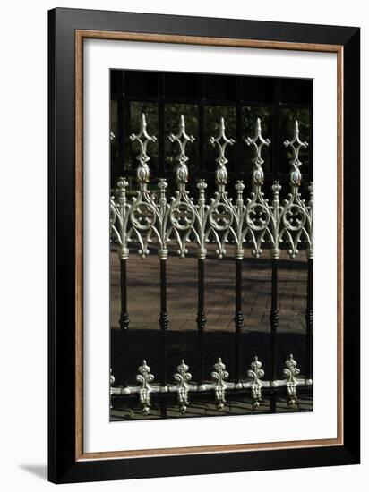 Close Up of Elaborate White Finials on Black Metal Railings-Natalie Tepper-Framed Photo