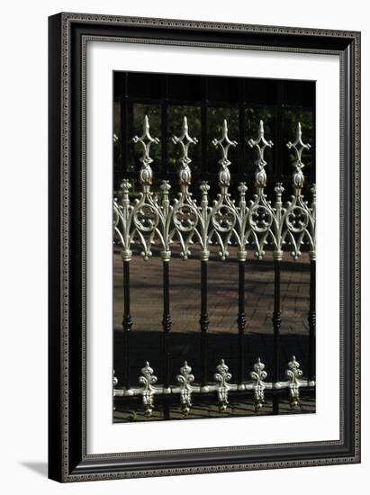 Close Up of Elaborate White Finials on Black Metal Railings-Natalie Tepper-Framed Photo