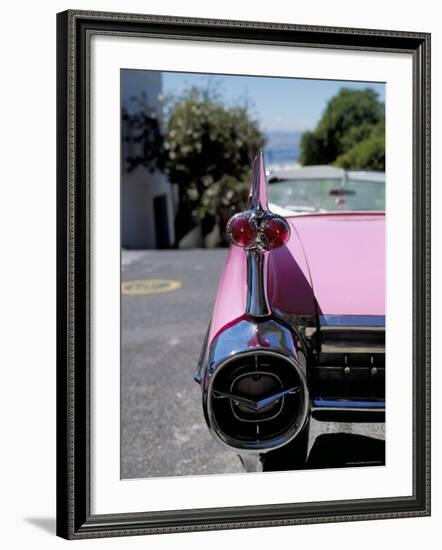 Close-Up of Fin and Lights on a Pink Cadillac Car-Mark Chivers-Framed Photographic Print