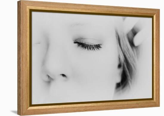 Close-Up of One Side of Young Woman's Face with Focus on the Eyelashes of Her Closed Eye-Henriette Lund Mackey-Framed Premier Image Canvas