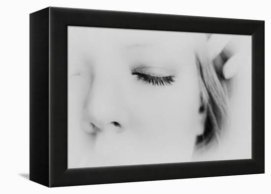 Close-Up of One Side of Young Woman's Face with Focus on the Eyelashes of Her Closed Eye-Henriette Lund Mackey-Framed Premier Image Canvas