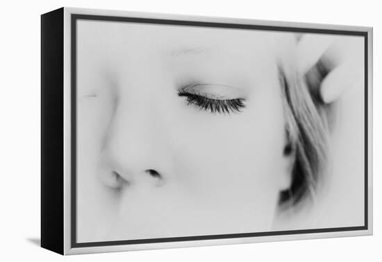 Close-Up of One Side of Young Woman's Face with Focus on the Eyelashes of Her Closed Eye-Henriette Lund Mackey-Framed Premier Image Canvas