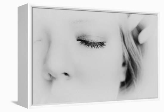 Close-Up of One Side of Young Woman's Face with Focus on the Eyelashes of Her Closed Eye-Henriette Lund Mackey-Framed Premier Image Canvas