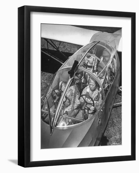 Close Up of Soldiers Sitting in Glider-Dmitri Kessel-Framed Photographic Print